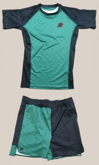 Sleek, sustainably designed shorts and t-shirt combination.  Albino and Preto Harp Fitted Shorts, Black/Green.   Both pieces are sized Adult XL.  Abbreviated for "ZERO WASTE" the ZW program by Albino & Preto is the brand's latest initiative in functional athletic-wear, keeping sustainability in mind.  Designed and MADE IN USA