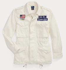 Part of the Polo Ralph Lauren Team USA Collection, this twill field jacket combines utility-inspired details, such as patch pocketing and shoulder epaulets, with signature embroidery that includes a historical American flag and the Olympic Rings.  Orders for this product will ship 9/14/24.  Expedited orders can be shipped as soon as possible, for an additional $100.