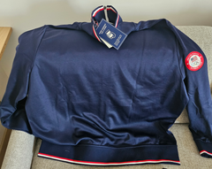 Part of the Polo Ralph Lauren Team USA Collection, this track jacket features an official logo patch of the U.S. Olympic Team and the legendary designer's signature embroidered Pony.  Made with a cotton blend, this double-knit layer draws inspiration from vintage basketball warm-up suits.  Orders for this product will ship 9/14/24.  Expedited orders can be shipped as soon as possible, for an additional $100.